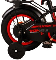 Schwarzes Fahrrad mit roten Akzenten und luxuriösem, weichem Sattel