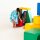 Zwei Kinder spielen mit bunten, geometrischen Spielblöcken aus Schaumstoff
