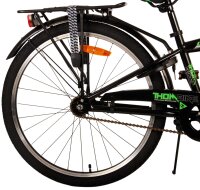 Grünes Fahrrad mit blauen Akzenten, luxuriösem Sattel und extra weichen Griffen