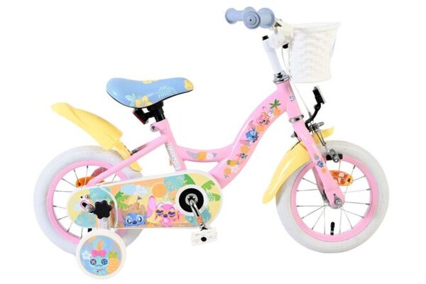 Rosa Kinderfahrrad mit bunten Aufklebern und Korb vorne