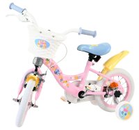 Rosa Kinderfahrrad mit Korb, Stützrädern und bunten Blumenmotiven