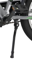 Fahrradständer aus schwarzem Metall an einem grauen Fahrradrahmen