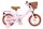 Rosa Kinderfahrrad mit Korb, braunen Reifen und beigem Sattel