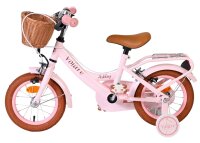 Rosa Kinderfahrrad mit Korb und braunem Sattel