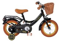 Schwarzes Kinderfahrrad mit Korb, braunen Details und...
