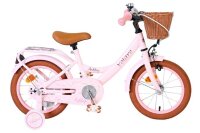 Rosa Kinderfahrrad mit Korb, braunen Reifen und bequemer...