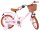 Rosa Kinderfahrrad mit Korb, braunen Reifen und bequemer Sitzfläche