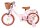Rosa Kinderfahrrad mit Korb, braunen Reifen und bequemen Sitz
