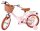 Rosa Kinderfahrrad mit Korb, braunen Reifen und gepolstertem Sattel