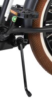 Fahrradpedal mit schwarzem Rahmen und braunem Reifenprofil