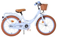Helles Kinderfahrrad mit Korb, braunen Reifen und beigem...