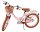 Rosa Damenfahrrad mit Korb und braunen Reifen