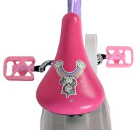 Rosa Fahrradsattel mit Einhorn-Motiv und bunten Pedalen