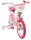 Rosa Kinderfahrrad mit Einhorn-Motiv und Korb vorne