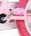 Rosa Fahrradpedal an einem pinken Fahrradrahmen mit silberner Achse