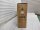 Braune Kartonverpackung mit Produktinformationen und pinkem Inhalt