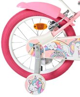 Pinkes Kinderfahrrad mit Einhorn-Motiv und bunten Reifen