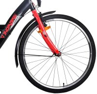 Fahrrad mit schöner Klingel und Reflektoren in den Rädern