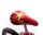 Roter Fahrradsattel mit auffälligem Design und glänzender Oberfläche