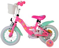 Rosa Kinderfahrrad mit weißen Reifen und Korb vorne