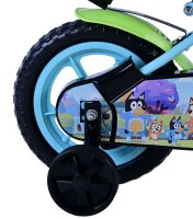 Buntes Kinderfahrrad mit Stützrädern und Comic-Motiv auf dem Rahmen