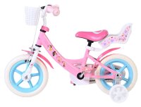 Rosa Kinderfahrrad mit weißen Reifen und Korb vorne