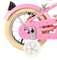 Rosa Fahrrad mit einem kleinen, hellen Reifen und...