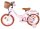 Rosa Kinderfahrrad mit Korb, braunen Reifen und bequemen Sattel
