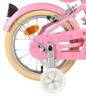 Rosa Kinderfahrrad mit beigem Reifen und Rücklicht...