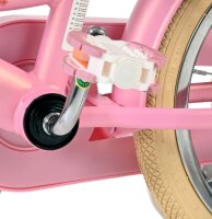 Rosa Kinderfahrrad mit weißem Pedal und braunem Reifen
