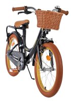 Schwarzes Kinderfahrrad mit Korb, braunen Griffen und orangefarbenen Reifen