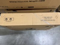 Braune Kartonverpackung mit Hinweis auf die richtige Oberseite