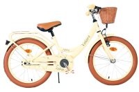 Beige Damenfahrrad mit Korb und braunen Reifen