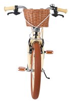 Fahrrad mit Korb, braunen Reifen und hellen Griffen von vorne betrachtet