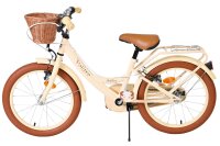Beige Kinderfahrrad mit Korb, braunem Sattel und dicken Reifen