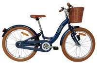 Blaues Kinderfahrrad mit Korb, braunen Reifen und...