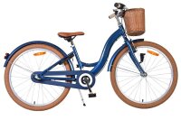 Blaues Fahrrad mit Korb, braunen Reifen und bequemer...