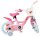 Rosa Kinderfahrrad mit bunten Aufklebern und Korb vorne