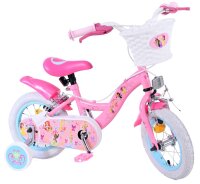 Rosa Kinderfahrrad mit Korb, bunten Aufklebern und...