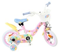 Kinderfahrrad in Pink mit bunten Blumenmotiven und Korb vorne
