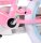 Rosa Kinderfahrrad mit pinken Pedalen und weißen Reifen