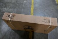 Kartonverpackung mit Hinweisen zur Handhabung und Aufschrift