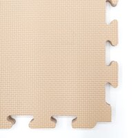 Bodenmatte aus schaumigem Material in hellem Beige mit Struktur