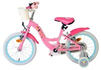 Rosa Kinderfahrrad mit Korb, weißen Reifen und bunten Aufklebern